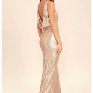 Gold sequin dress with open back.